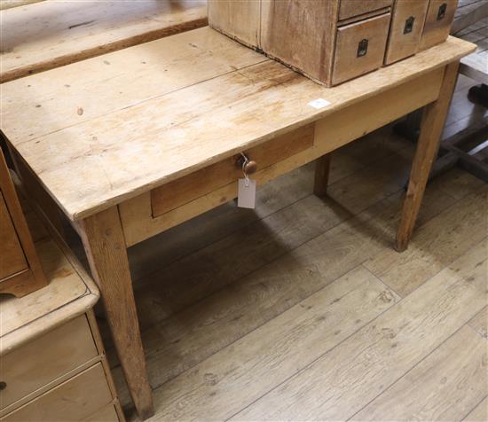 A pine drop leaf table with drawer, W.115cm